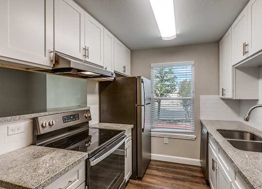 Stainless steel appliances at Mission James Place Apartments in Austin TX