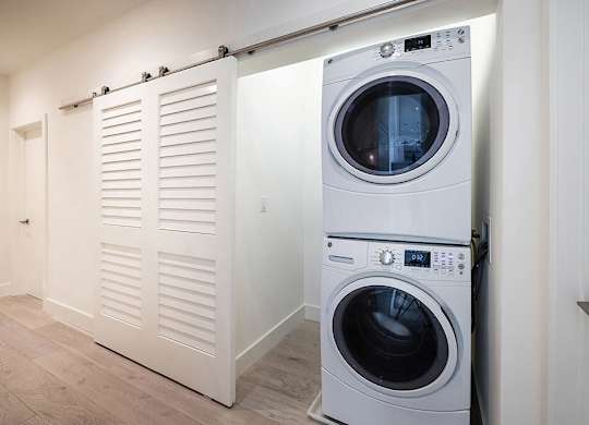 In unit washing machine and dryer at The Cove at Tiburon Apartments in Tiburon CA