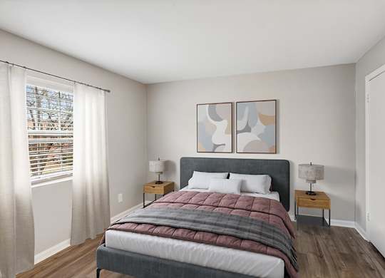 Bedroom with furniture at Villages at Marley Station in Glen Burnie MD