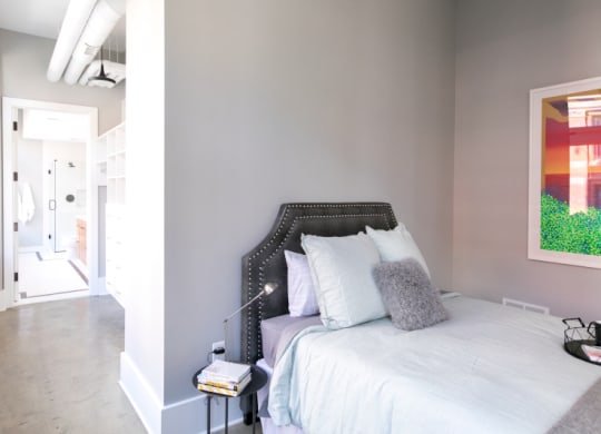 Bedroom with Gray Walls and a White Bed at Fourteen56, Detroit, MI