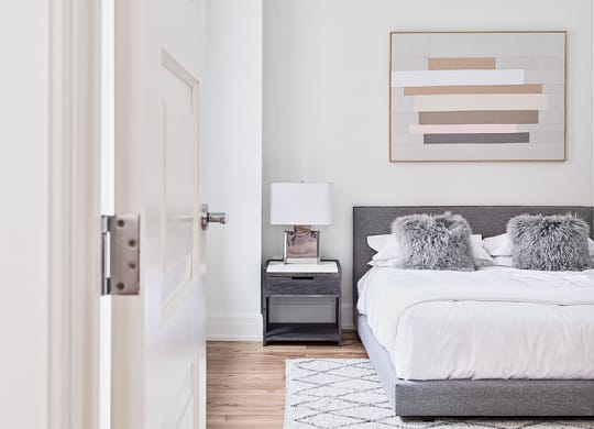 Bedroom with bed  and modern furnishings at Vinton.