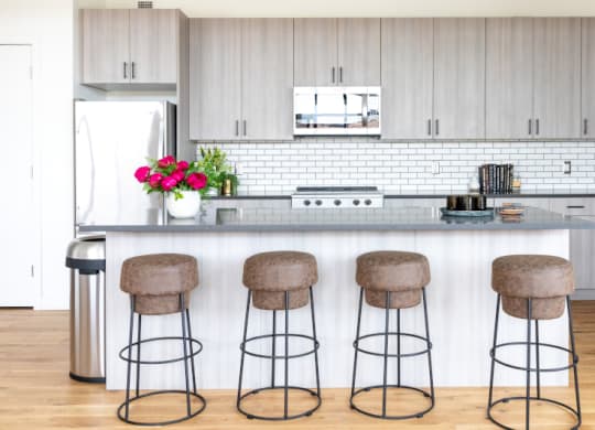  Kitchen Bar with Beige Stools at The Assembly, Detroit, MI
