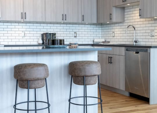 Kitchen Island with Bar Stools at The Assembly, Detroit, MI