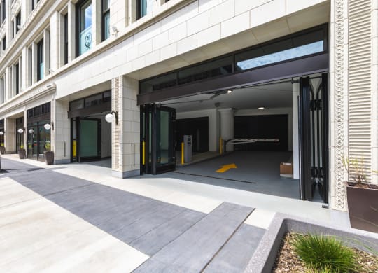 Parking garage entrance with sliding doors. at The May, Cleveland, OH, 44114