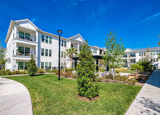 exterior view of apartments at the preserve at city center apartments at Altis Grand Suncoast, Florida, 34638