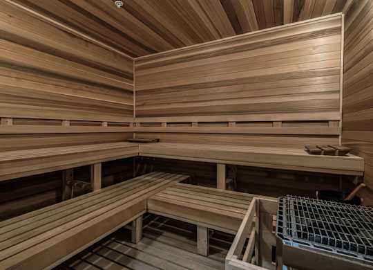 a sauna in a treatment room in a home gym at Altis Twin Lakes Apartments, Florida, 34744