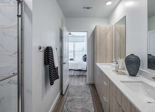 a bathroom with a sink and a mirror at Altis Grand Suncoast, Florida
