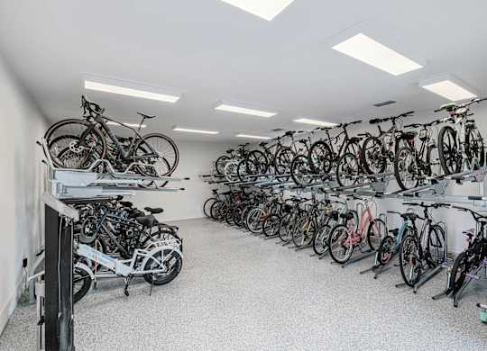 A bike shop with many bikes on display.