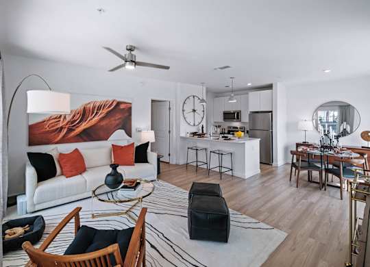 a living room with a couch and a table at Altis Grand Suncoast, Land O' Lakes, 34638