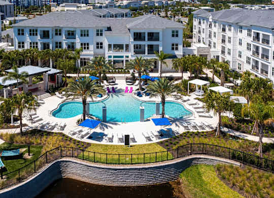 a swimming pool at the resort at longboat key club at Altis Grand Lake Willis, Florida, 32821