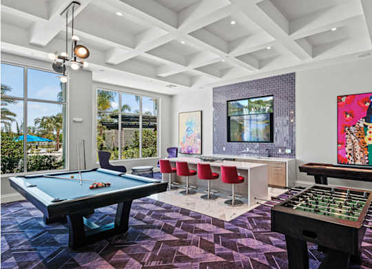 a game room with a pool table and a barat Altis Grand Lake Willis, Orlando, FL 32821