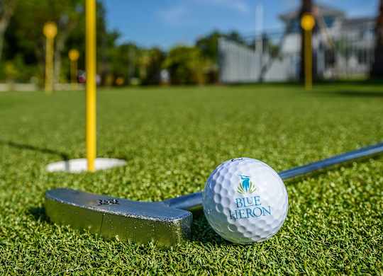 A golf ball with the words