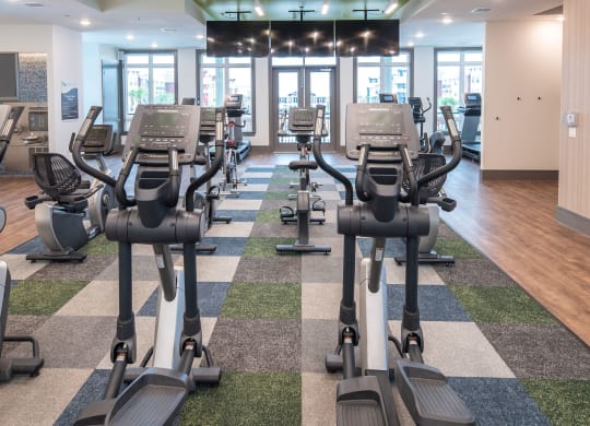 Lewisville, TX Apartments for Rent - Hebron 121 Station Fitness Center with Excercise Bikes, Ellipticals, Treadmills, and More