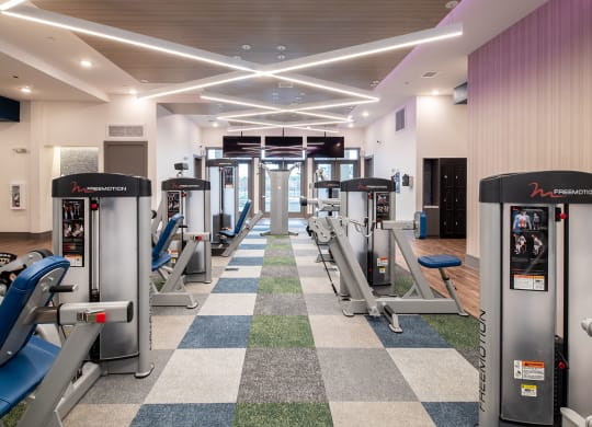 Lewisville, TX Apartments - Hebron 121 Station - 2-story, Tech Advanced Fitness Center Equipped With Multiple Strength Training Machines, T.Vs, And Water Fountain Station,