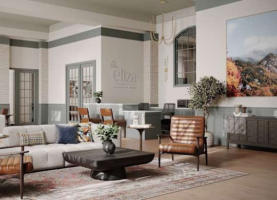 A living room with a couch, chairs, and a coffee table.