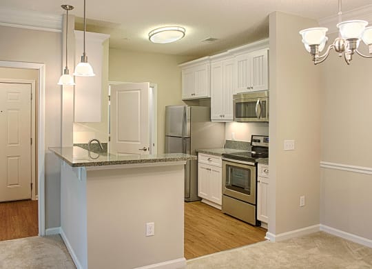 kitchen with white cabinets