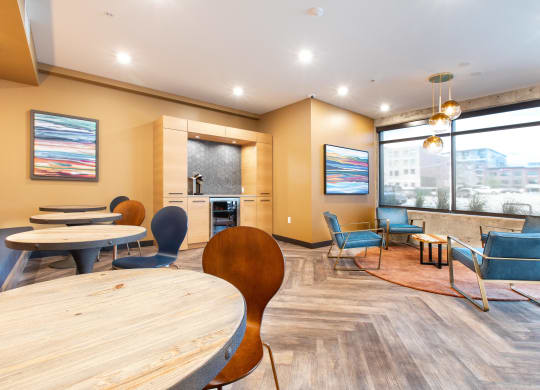 the reserve at bucklin hill clubhouse with tables and chairs