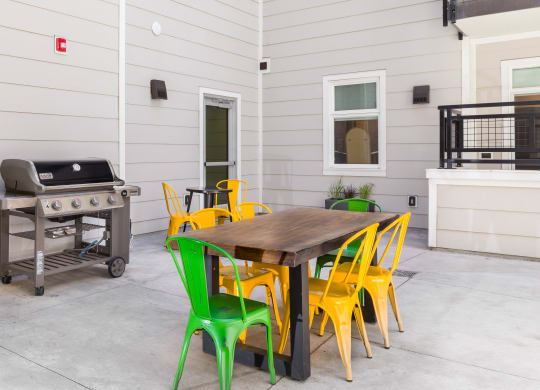 the patio at the whispering winds apartments in pearland, tx