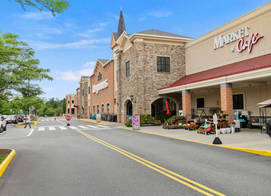 the street is empty in front of the market city shopping mall