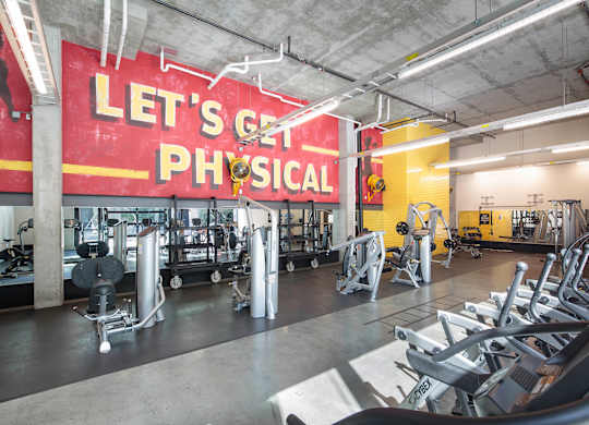 Fitness center weights at Idea1 Apartments in in San Diego CA