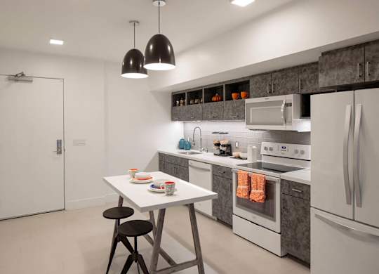 Modern finish kitchen with island at Idea1 Apartments in in San Diego CA