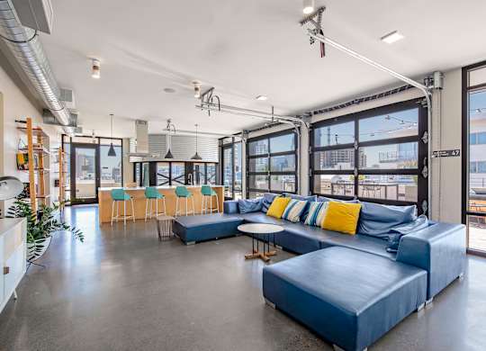 Social lounge covered patio at Idea1 Apartments in in San Diego CA