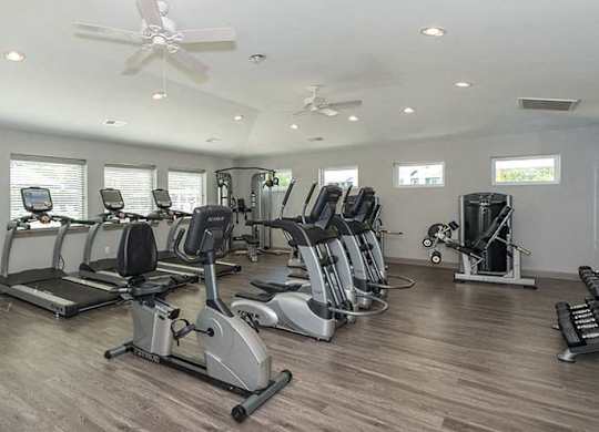 fitness center with cardio equipment