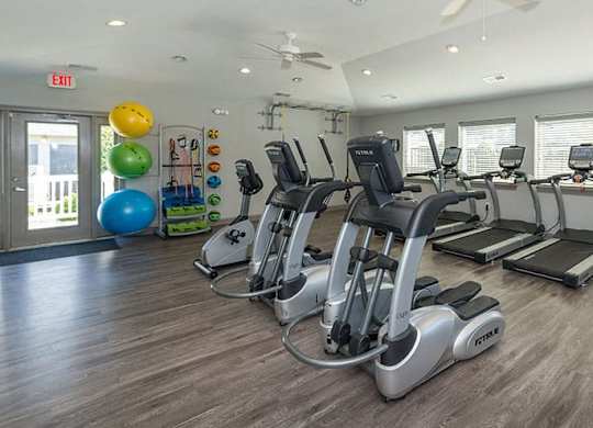 fitness center with cardio equipment