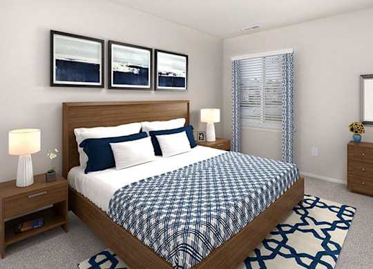 bedroom of the apartment showing queen bed with a window and artwork