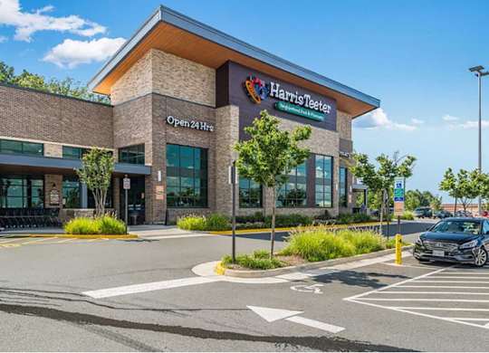 a health care center with a car parked in front of it