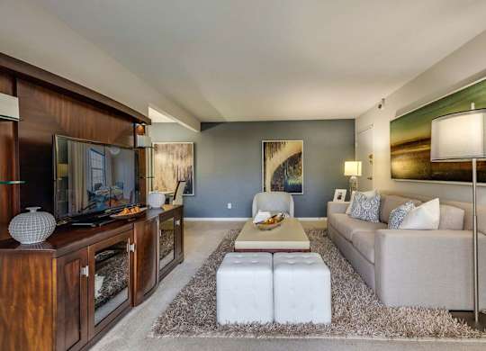 a living room with a couch and a table