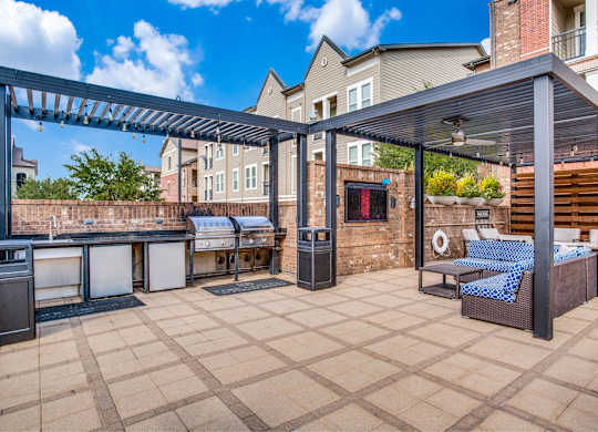 Resort style pool with lounge seating and grilling area