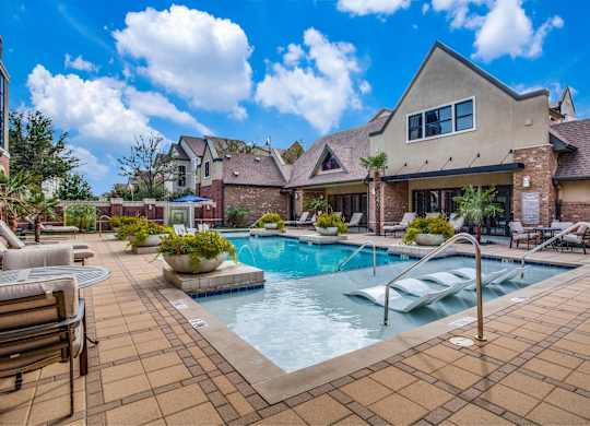 Resort style pool with lounge seating