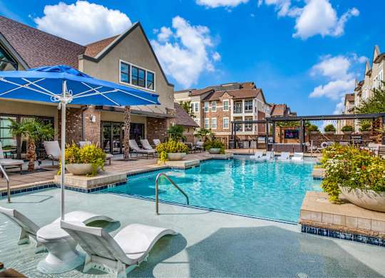 Resort style pool with lounge seating