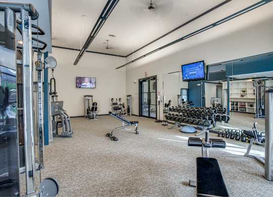 Updated Fitness Center with cardio and weight equipment