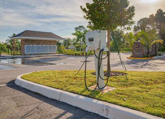 A charging station for electric vehicles is located in a parking lot at Mode at Melbourne, LLC Apartments, Melbourne, FL