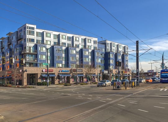 a large building on the corner of a city street