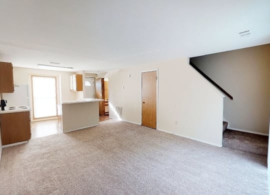 Carpeted Living Area at Woodhills Apartments, West Carrollton, OH