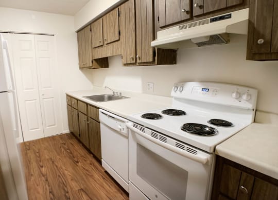Kitchen With Custom Maple Cabinetry  at Concord Woods Apartments, Milford