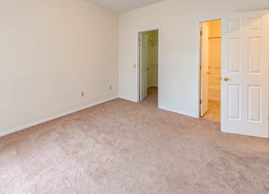 Master Bedroom With Walk-In Closet at Blueberry Hill Apartments, Rochester, NY
