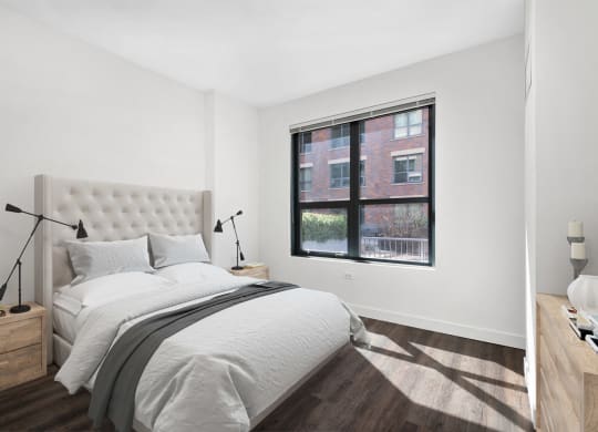 Beautiful Bright Bedroom With Wide Windows at The Madison at Racine, Chicago