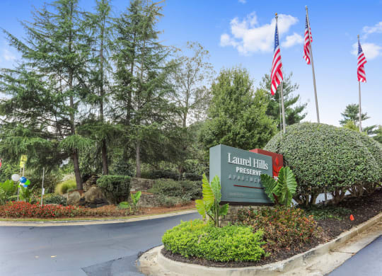 Property Sign with lush landscaping