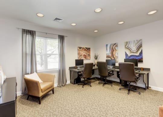 a room filled with furniture and a large window