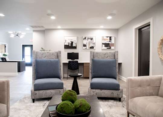 Resident seating in clubhouse at Governor Square Apartments, Carmel, IN