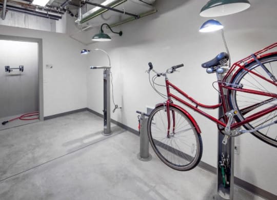 The Wilmore bike locker room with bike hanging
