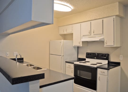 kitchen with white cabinets