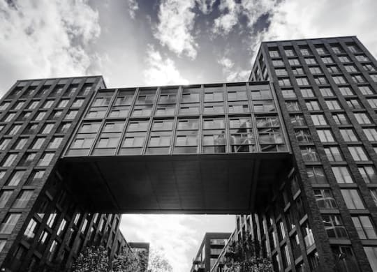 a black and white photo of a tall building