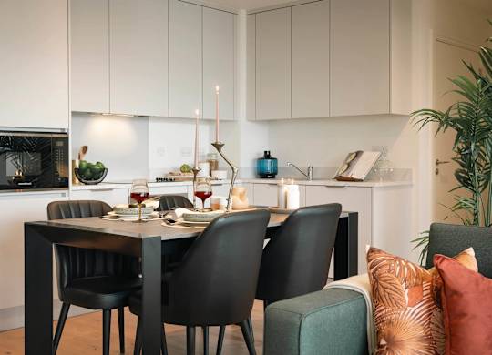 A modern dining room with a table set for two. at Cherrywood Apartments, D18 VY3V, DUBLIN 18