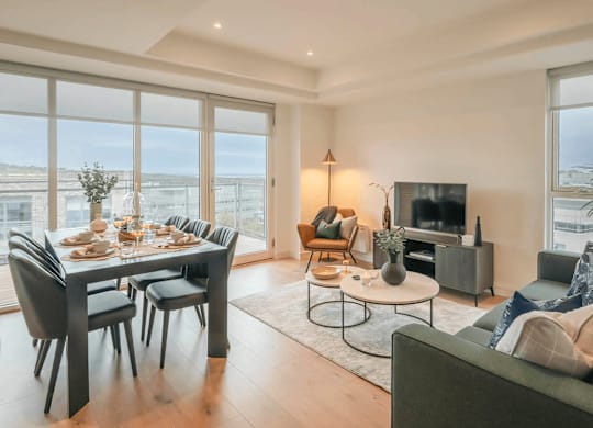 A modern living room with a dining table and a couch. at Cherrywood Apartments, D18 VY3V, DUBLIN 18