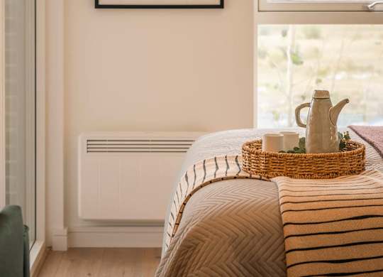 A bedroom with a bed and a picture on the wall at Cherrywood Apartments, D18 VY3V